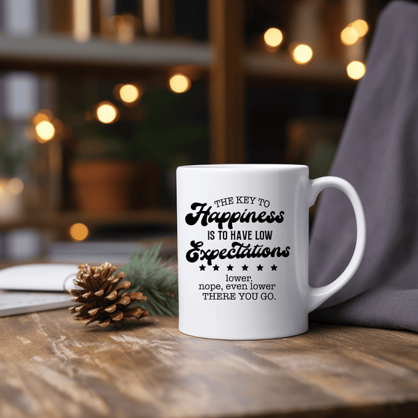 Funny Coffee Mugs | The Key To Happiness Is Low Expectations. Lower. Nope, even lower. There you go